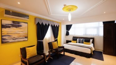 yellow-executive-hotel-room-osu-wide-angle